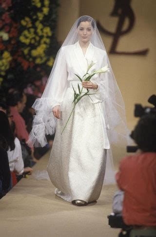 robe de mariée ysl|Yves Saint Laurent en 17 robes de mariée iconiques.